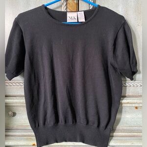 Black short sleeve knit top with round neckline
